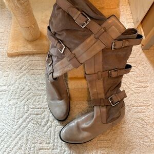 Pull on grey suede like boots with buckles around boots. So nice! Size 7B.